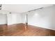 Spacious living room with hardwood floors and neutral walls at 636 N Washington St # 301, Denver, CO 80203