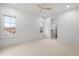 This bedroom has bright, neutral colors and a walk-in closet, making it a relaxing space to unwind at 2056 S Ogden St, Denver, CO 80210