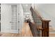 Inviting hallway boasts hardwood floors, natural light and access to the dining room, creating a seamless flow at 2056 S Ogden St, Denver, CO 80210