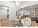 Open-concept living space featuring hardwood floors, high ceilings, and modern finishes at 2056 S Ogden St, Denver, CO 80210