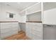 Well-organized walk-in closet with custom shelving and plenty of storage space at 2056 S Ogden St, Denver, CO 80210