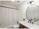 Clean bathroom with updated vanity and fixtures at 7933 York St # 1, Denver, CO 80229