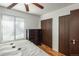 Spacious bedroom with double closets and dresser at 7933 York St # 1, Denver, CO 80229