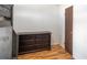 Spare bedroom with dresser and closet at 7933 York St # 1, Denver, CO 80229