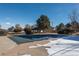 Community swimming pool with winter cover at 7933 York St # 1, Denver, CO 80229