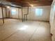 Unfinished basement with exposed ceiling, insulated walls, and concrete flooring at 14938 Clayton St, Thornton, CO 80602