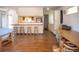 Open kitchen with a breakfast bar and ample counter space at 1257 Quitman St, Denver, CO 80204