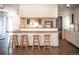 Open kitchen layout with breakfast bar and generous cabinet storage at 1257 Quitman St, Denver, CO 80204