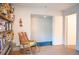 Cozy reading nook with built-in bookshelves and a comfortable rocking chair at 1257 Quitman St, Denver, CO 80204