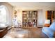 Sunlit living room showcasing beautiful hardwood floors and natural light at 1257 Quitman St, Denver, CO 80204