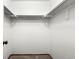 Empty closet with built in clothing rod and carpet floor at 5745 W Atlantic Pl # 108, Lakewood, CO 80227