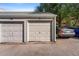 Detached single-car garage showcasing ample parking space and convenient storage options at 5745 W Atlantic Pl # 108, Lakewood, CO 80227
