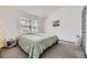 Well-lit bedroom featuring a large window and minimalist decor at 3010 W Prentice Ave # J, Littleton, CO 80123