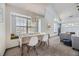 Bright dining area with ample natural light, perfect for enjoying meals with Gathering and friends at 3010 W Prentice Ave # J, Littleton, CO 80123