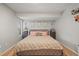 Inviting bedroom with a large bed and decorative accents at 12112 Melody Dr # 302, Denver, CO 80234