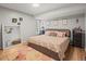 Charming bedroom with a cozy rug and ample natural light at 12112 Melody Dr # 302, Denver, CO 80234