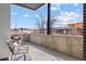 Outdoor balcony with modern seating and views of the neighborhood, providing a relaxing retreat at 1250 Yates St, Denver, CO 80204