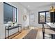 Bright entryway with modern decor, hardwood floors, and stylish accents, creating a chic welcome at 1250 Yates St, Denver, CO 80204