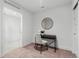 Minimalist office featuring a modern desk, chair, and soft carpet at 1250 Yates St, Denver, CO 80204