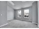 Bright bedroom featuring grey walls and carpet at 3071 W 107Th Pl # C, Westminster, CO 80031