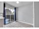 Simple dining area with sliding glass door to backyard at 3071 W 107Th Pl # C, Westminster, CO 80031