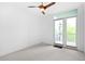 Bedroom with neutral carpet and a private balcony at 1401 Delgany St # 211, Denver, CO 80202