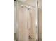 Close up of shower with a shower head at 1401 Delgany St # 211, Denver, CO 80202