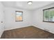 Cozy bedroom with carpet, blinds, natural light, and neutral decor creates a serene atmosphere at 925 Fulton St, Aurora, CO 80010