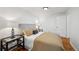 Comfortable bedroom featuring a queen bed with side tables and lamps, offering a relaxing retreat at 925 Fulton St, Aurora, CO 80010