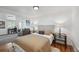 Comfortable main bedroom with hardwood floors, a neutral color palette, and a sitting area at 925 Fulton St, Aurora, CO 80010