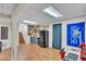 Basement with kitchenette including refrigerator, cabinetry, and counter, plus room for recreational activities at 12079 E Louisiana Ave, Aurora, CO 80012