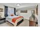 Comfortable bedroom with a window and carpet at 12079 E Louisiana Ave, Aurora, CO 80012