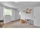 Bedroom with carpet, large window, closet with mirrored doors, and neutral decor at 12079 E Louisiana Ave, Aurora, CO 80012