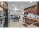 Updated kitchen with modern appliances, countertops, and ample cabinet space at 12079 E Louisiana Ave, Aurora, CO 80012