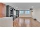 Basement entertainment area featuring built-in shelving and a projection screen for cinematic experiences at 8053 E Maple Ave, Denver, CO 80230