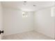 Bright basement featuring neutral walls and carpet with a well window for natural light at 4261 Julian St, Denver, CO 80211