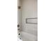 Modern bathroom featuring a bathtub, white tile, and a built-in niche at 4261 Julian St, Denver, CO 80211