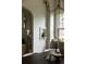 Inviting dining room with arched doorway, window seating, and modern chandelier at 4261 Julian St, Denver, CO 80211
