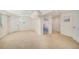 Spacious finished basement features neutral carpet, and multiple access doors at 9921 Spring Hill Pl, Highlands Ranch, CO 80129