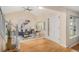 Open living room with hardwood floors, bright decor, and natural light at 9921 Spring Hill Pl, Highlands Ranch, CO 80129