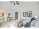 Spacious main bedroom showcasing an ensuite bathroom and access to a bonus room with a loft at 9921 Spring Hill Pl, Highlands Ranch, CO 80129