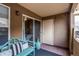 Relaxing balcony with seating, slider, and view of neighborhood at 4730 Copeland Cir # 204, Highlands Ranch, CO 80126