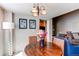 Cozy dining area with wooden table and chairs, next to the open living space at 4730 Copeland Cir # 204, Highlands Ranch, CO 80126