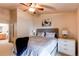 Comfortable primary bedroom showcasing a ceiling fan and decor at 4730 Copeland Cir # 204, Highlands Ranch, CO 80126