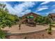 Outdoor playground with swings, slides, and play structures for Gathering fun at 4730 Copeland Cir # 204, Highlands Ranch, CO 80126