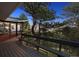 Spacious deck with scenic views of surrounding trees at 25392 Westridge Rd, Golden, CO 80403