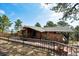 Charming single-story home featuring stone accents and a covered porch for enjoying the outdoors at 25392 Westridge Rd, Golden, CO 80403