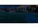 Scenic night view with beautiful landscape, distant city lights, mature trees and home at 25392 Westridge Rd, Golden, CO 80403