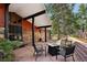 Inviting patio with a fire pit and comfortable seating, perfect for outdoor gatherings at 25392 Westridge Rd, Golden, CO 80403