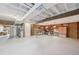 Spacious unfinished basement offers ample storage and potential for customization at 4152 S Vrain St, Denver, CO 80236